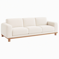 Canapé 3 places 220 cm tissu écru piètement bois style contemporain